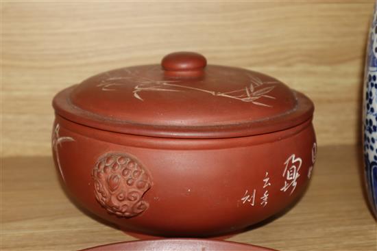 A Yixing pottery covered bowl and stand and a similar teapot